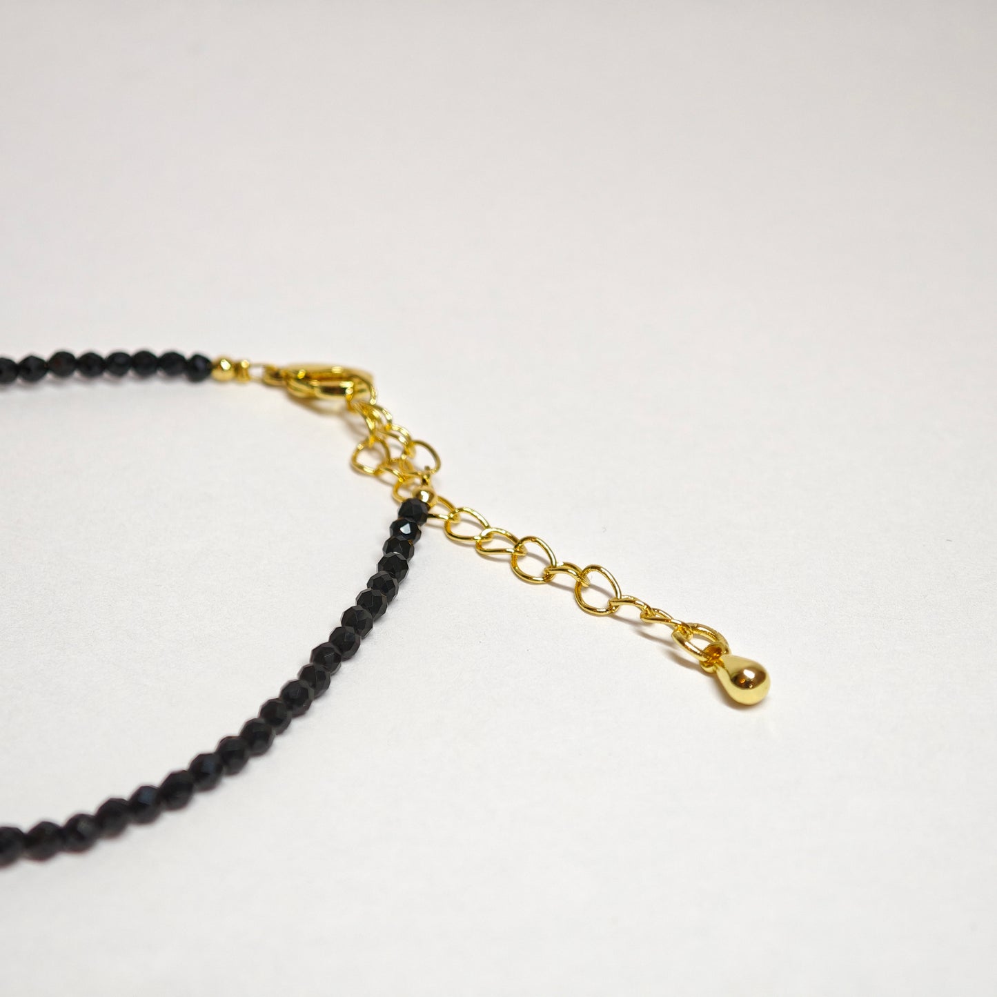 Schwarzes Spinellarmband mit Barockperle