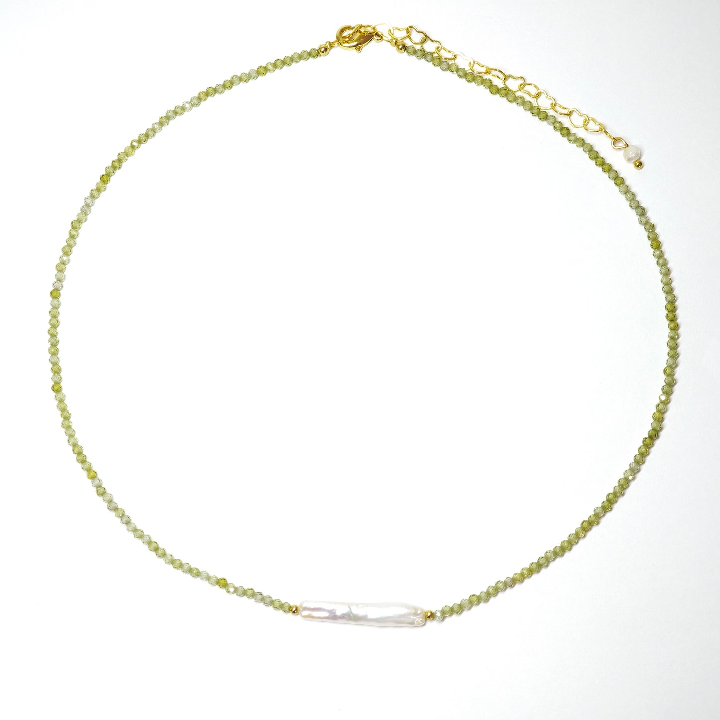 Green zircon necklace with baroque pearl
